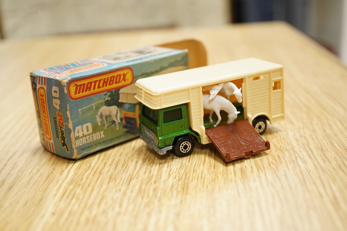 Twelve boxed Matchbox Superfast and Rola-matics 1-75 vehicles; Seafire (5), VW Golf (7), the Londoner bus (17), refuse truck (36), zoo truck (35), camper (38), horsebox (40), police launch (52), airport coach (65), S-P G